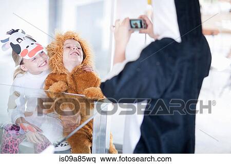 Boy taking pictures with camera View Large Photo Image Stock Photography - Boy taking pictures with camera. Fotosearch
