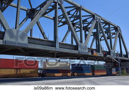 Bridge and cargo containers at the Port of Los Angeles, California, USA View Large Photo Image Picture - Bridge and cargo containers at the Port of Los Angeles, California, USA. Fotosearch