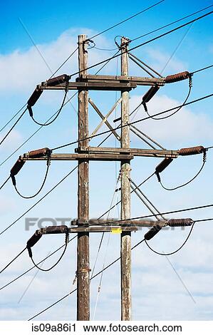 Stock Image - Cables connected to telegraph pole. Fotosearch