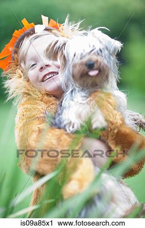 Child wearing lion costume View Large Photo Image Stock Image - Child wearing lion costume. Fotosearch