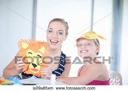 Picture - Children's mask making party. Fotosearch