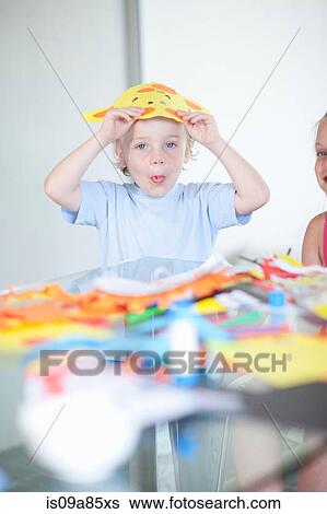 Stock Photograph - Children's mask making party. Fotosearch