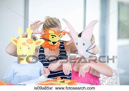 Stock Photography - Children's mask making party. Fotosearch
