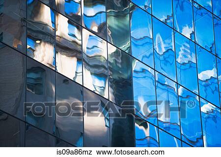 Close up of modern reflective facade View Large Photo Image Stock Photo - Close up of modern reflective facade. Fotosearch
