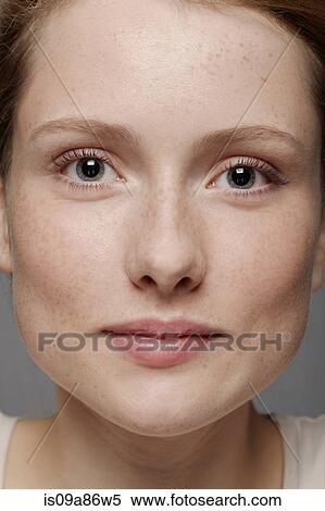 Close up of young woman's face View Large Photo Image Stock Photography - Close up of young woman's face. Fotosearch