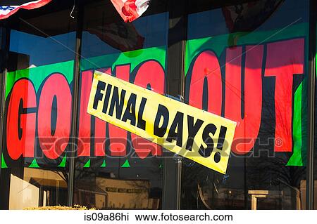 Stock Image - Closing down signs on store window. Fotosearch