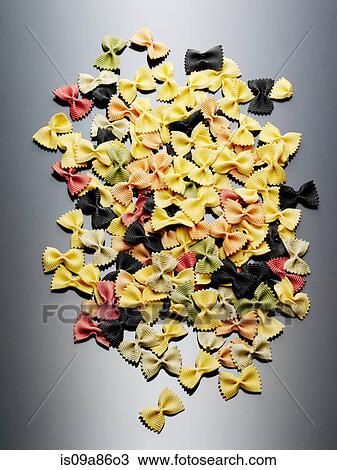 Colorful still life of dried farfalle pasta View Large Photo Image Stock Image - Colorful still life of dried farfalle pasta. Fotosearch