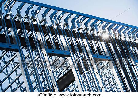 Stock Photography - Construction frame of steel girders on construction site. Fotosearch