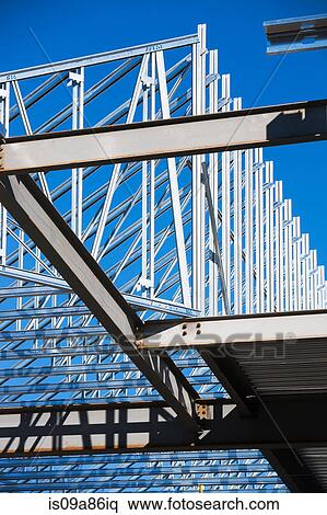 Construction frame of steel girders on construction site View Large Photo Image Stock Photography - Construction frame of steel girders on construction site. Fotosearch