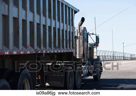 Construction truck on highway View Large Photo Image Stock Image - Construction truck on highway. Fotosearch