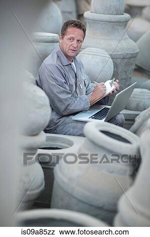 Dealing with sales in pottery factory View Large Photo Image Stock Photo - Dealing with sales in pottery factory. Fotosearch