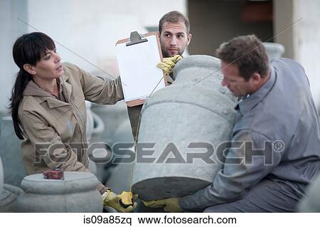 Dealing with sales in pottery factory View Large Photo Image Stock Photography - Dealing with sales in pottery factory. Fotosearch