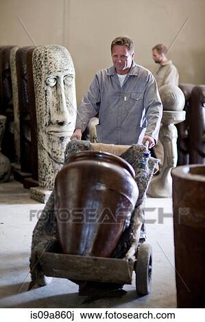 Delivering vase in pottery factory View Large Photo Image Stock Image - Delivering vase in pottery factory. Fotosearch