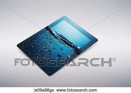 Digital tablet with gently rising bubbling water on screen View Large Photo Image Stock Photo - Digital tablet with gently rising bubbling water on screen. Fotosearch