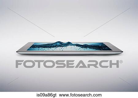 Digital tablet with gently rising bubbling water on screen View Large Photo Image Stock Photograph - Digital tablet with gently rising bubbling water on screen. Fotosearch
