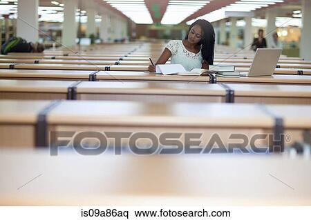 Female student studying in library View Large Photo Image Stock Photography - Female student studying in library. Fotosearch