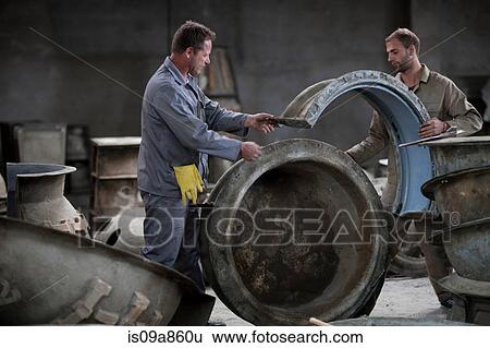Fetching potters wheel at pottery factory View Large Photo Image Stock Photograph - Fetching potters wheel at pottery factory. Fotosearch