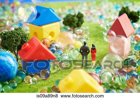 Figurines and houses made from plastic blocks with marbles View Large Photo Image Stock Photo - Figurines and houses made from plastic blocks with marbles. Fotosearch