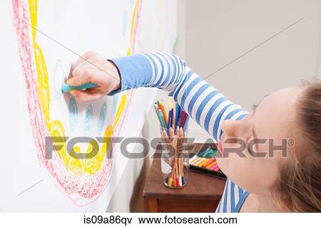 Girl drawing on wall View Large Photo Image Stock Photo - Girl drawing on wall. Fotosearch