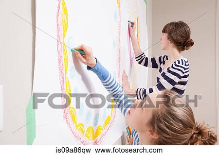 Girls drawing mural on wall View Large Photo Image Stock Photo - Girls drawing mural on wall. Fotosearch