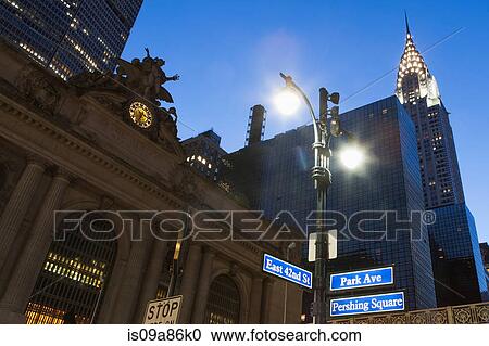 Stock Image - Grand Central Station and Chrysler Building at dusk, New York City, USA. Fotosearch