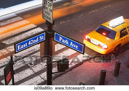 High angle view of Park Avenue street sign and pedestrian crossing New York City, USA View Large Photo Image Picture - High angle view of Park Avenue street sign and pedestrian crossing New York City, USA. Fotosearch