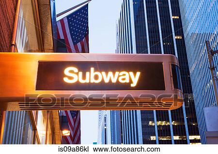 Stock Image - Illuminated subway sign, New York City, USA. Fotosearch