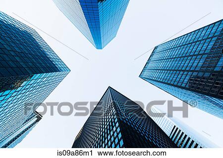 Stock Image - Low angled view of skyscrapers. Fotosearch