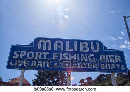 Stock Photo - Malibu Fishing pier sign in sunlight. Fotosearch
