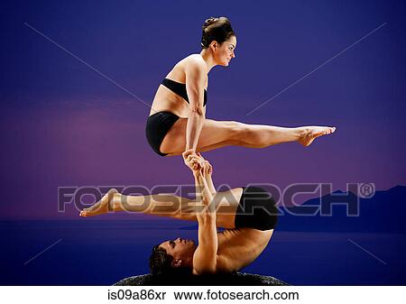 Mid adult dancers performing together at dusk View Large Photo Image Stock Photography - Mid adult dancers performing together at dusk. Fotosearch