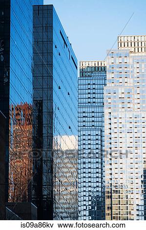 Stock Photo - Modern office buildings with glass facades. Fotosearch
