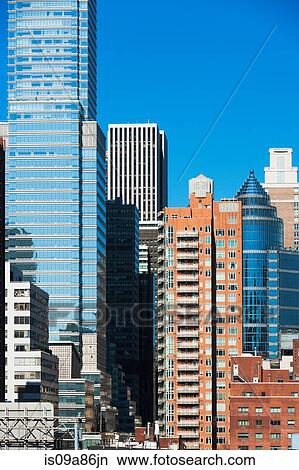 Modern skyscrapers in New York city View Large Photo Image Picture - Modern skyscrapers in New York city. Fotosearch