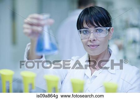 Oenologist checking laboratory tests View Large Photo Image Stock Image - Oenologist checking laboratory tests. Fotosearch