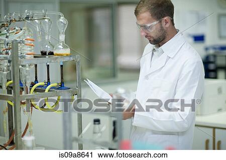 Oenologist monitoring sample testing in laboratory View Large Photo Image Stock Image - Oenologist monitoring sample testing in laboratory. Fotosearch