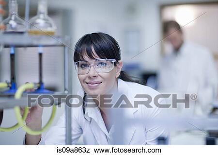 Oenologist monitoring sample testing in laboratory View Large Photo Image Stock Photo - Oenologist monitoring sample testing in laboratory. Fotosearch