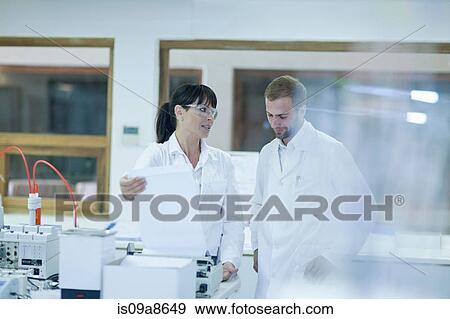Oenologist monitoring sample testing in laboratory View Large Photo Image Stock Photo - Oenologist monitoring sample testing in laboratory. Fotosearch
