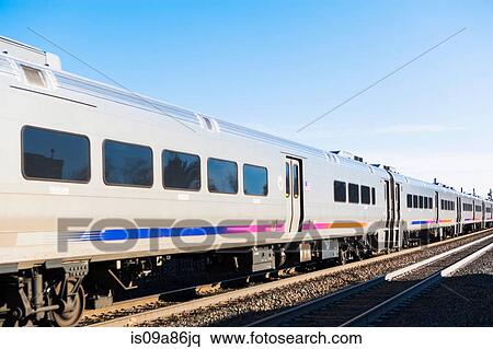 Passenger train on railroad View Large Photo Image Stock Photography - Passenger train on railroad. Fotosearch