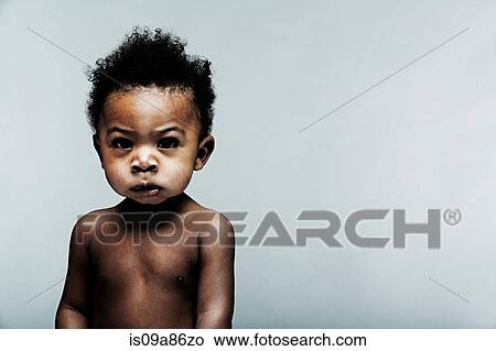 Portrait of baby boy looking at camera View Large Photo Image Picture - Portrait of baby boy looking at camera. Fotosearch