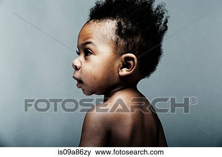 Portrait of baby boy looking away View Large Photo Image Stock Photo - Portrait of baby boy looking away. Fotosearch