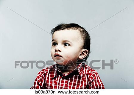 Portrait of baby boy wearing checked shirt View Large Photo Image Picture - Portrait of baby boy wearing checked shirt. Fotosearch