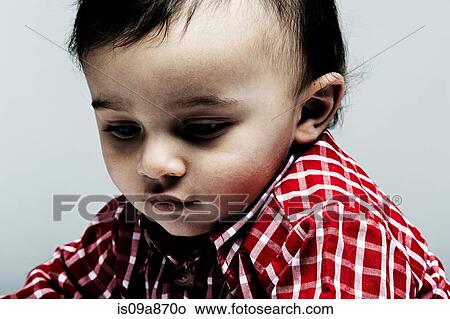 Portrait of baby boy wearing checked shirt View Large Photo Image Picture - Portrait of baby boy wearing checked shirt. Fotosearch
