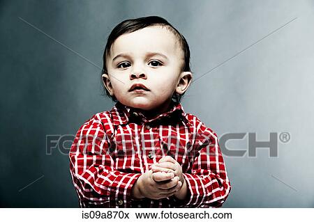Portrait of baby boy wearing checked shirt View Large Photo Image Stock Photo - Portrait of baby boy wearing checked shirt. Fotosearch