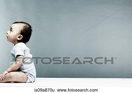 Portrait of baby boy wearing grey baby vest View Large Photo Image Stock Photograph - Portrait of baby boy wearing grey baby vest. Fotosearch