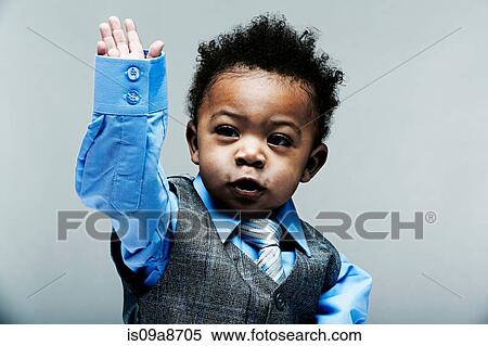 Portrait of baby boy wearing waistcoat, shirt and tie View Large Photo Image Stock Photography - Portrait of baby boy wearing waistcoat, shirt and tie. Fotosearch