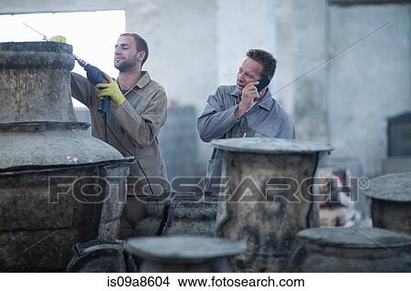 Putting harness on large vases View Large Photo Image Picture - Putting harness on large vases. Fotosearch