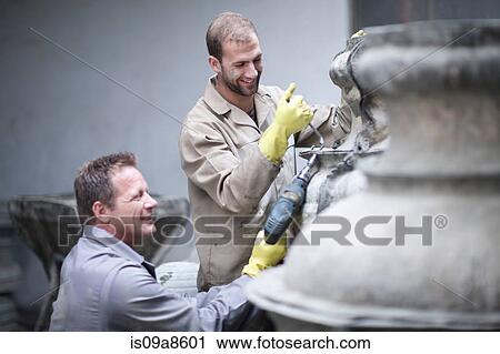 Putting harness on large vases View Large Photo Image Stock Image - Putting harness on large vases. Fotosearch