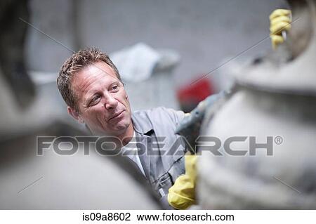 Putting harness on large vases View Large Photo Image Stock Image - Putting harness on large vases. Fotosearch