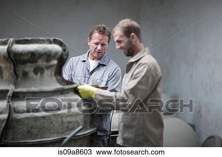 Putting harness on large vases View Large Photo Image Stock Image - Putting harness on large vases. Fotosearch