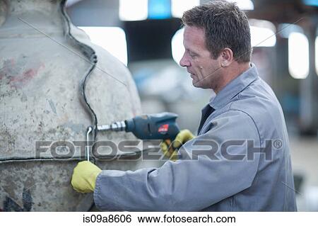 Putting harness on large vases View Large Photo Image Stock Photograph - Putting harness on large vases. Fotosearch