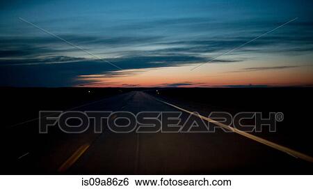 Road at sunset, South Dakota, USA View Large Photo Image Stock Photograph - Road at sunset, South Dakota, USA. Fotosearch